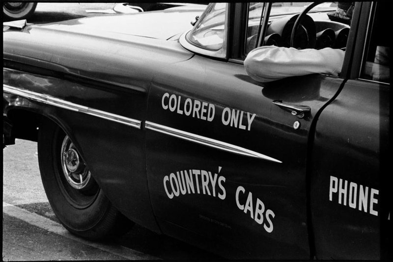 Danny Lyon - Segregated cab service, Alabama, Birmingham 1962