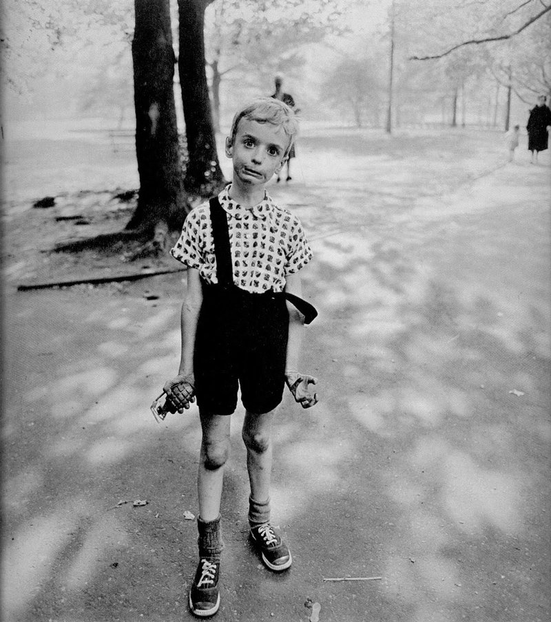 Diane Arbus - Child with a toy hand grenade in Central Park, New York City 1962