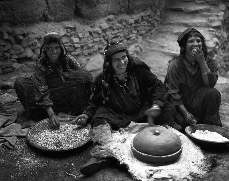 Pierre Choinière - A group of women stone-grinding grains into flour, Morocco 2010