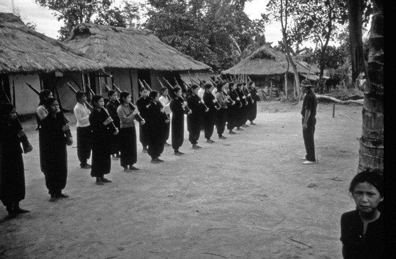Dickey Chapelle - A group of Vietnamese women train with rifles in a village near the Laotian border, Vietnam 1962