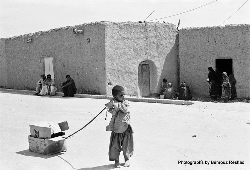 Behrouz Reshad - Baby with toy, Khash, Iran 1974