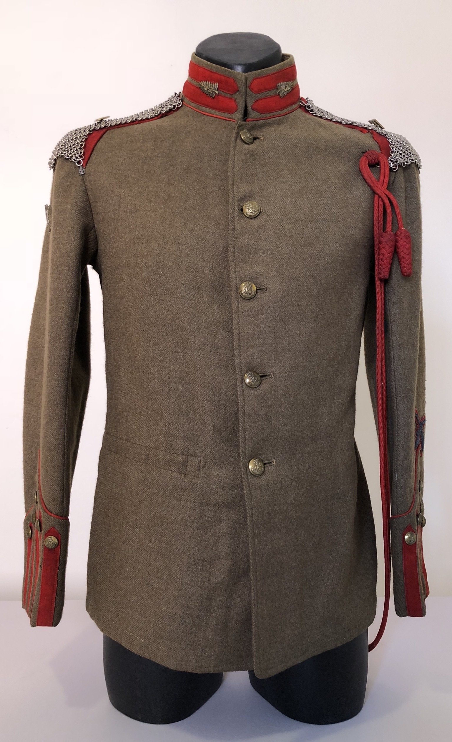 Full Dress tunic worn by Squadron Quarter Master Sergeant MacIntosh of the 3rd New Zealand troop of ‘D’ Squadron (South African), 4th County of London (King’s Colonial’s) Imperial Yeomanry, circa 1905-06. The tunic was made by Hobson and Sons, London and bears the name MacIntosh on the inside rear of the collar.