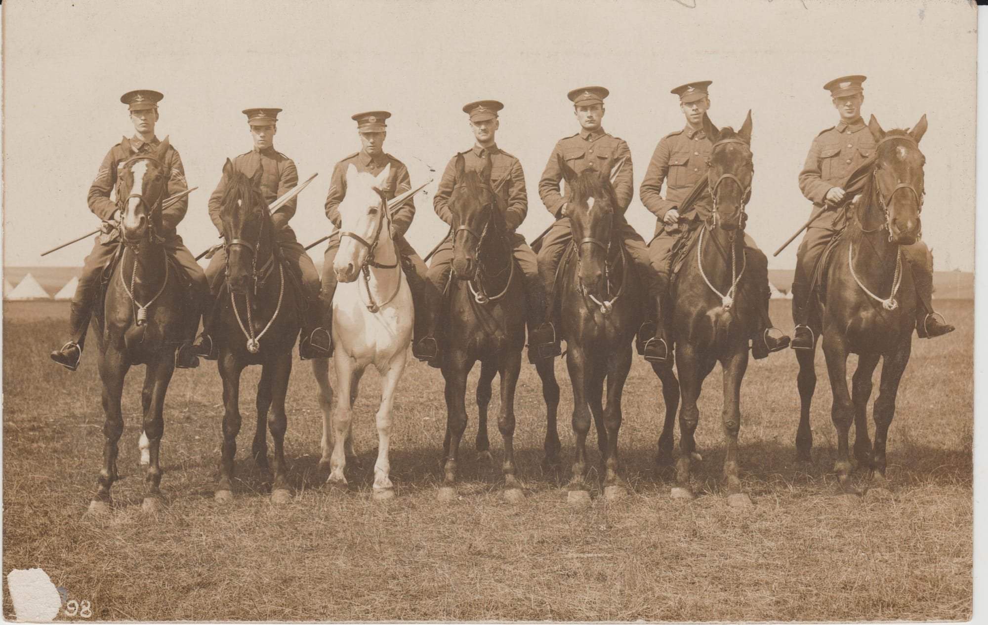 Mounted Troopers of the Australian, British African and New Zealand Troops of the King’s Colonials Imperial Yeomanry wearing a mixture of standard British Army Service Dress tunics and Undress tunics at signal training probably at annual camp circa 1908. The Sergeant is wearing a standard British Army Service Dress tunic with ‘C’ Squadron headdress and matching collar badges (Courtesy of Iain Davidson collection).