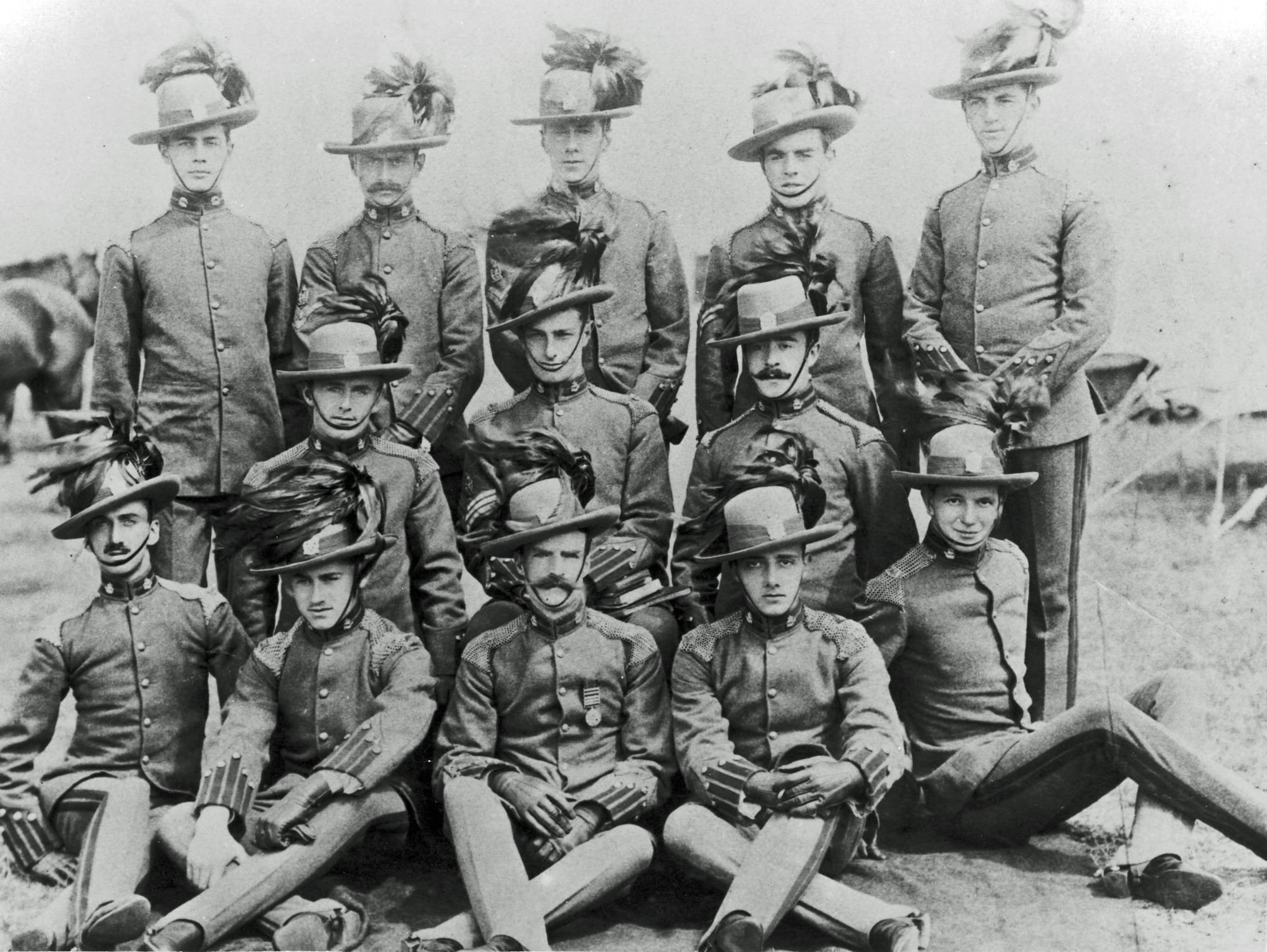 Group photograph of KEH Other Ranks in Full Dress uniform circa 1911 (Courtesy David Knight). Private Victor Rathbone, 106 (brother of British actor Basil Rathbone, Captain Basil Rathbone, MC, Liverpool Scottish) is seated to the left hand side.