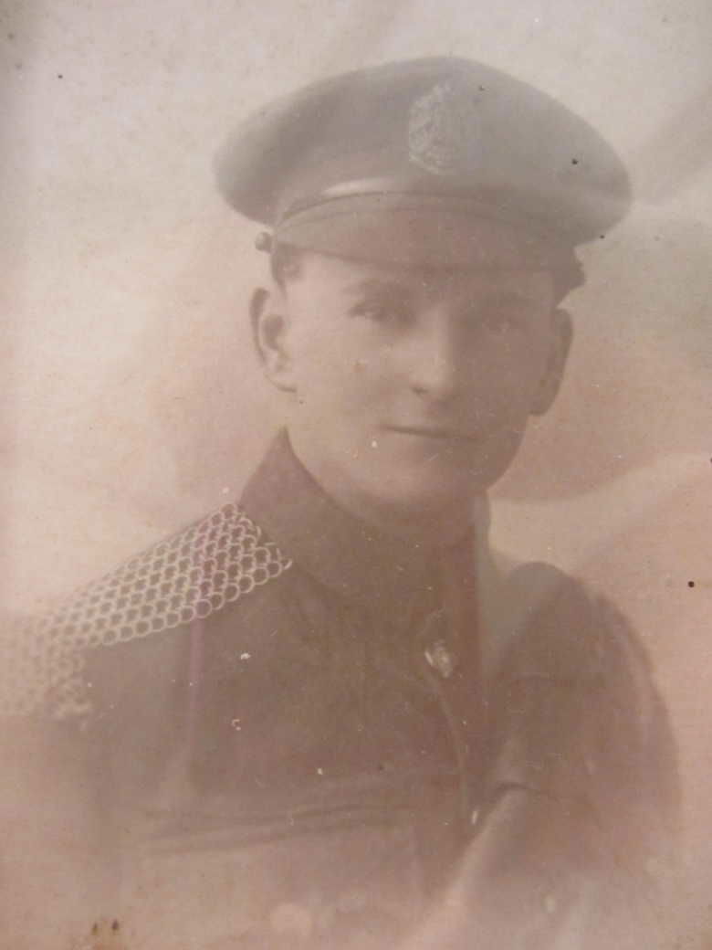TRICKETT, Ronald Arthur. Private 1974 2KEH (cap badge is 2KEH). Transferred to KEH as Private 2079. Courtesy of Ancestry.