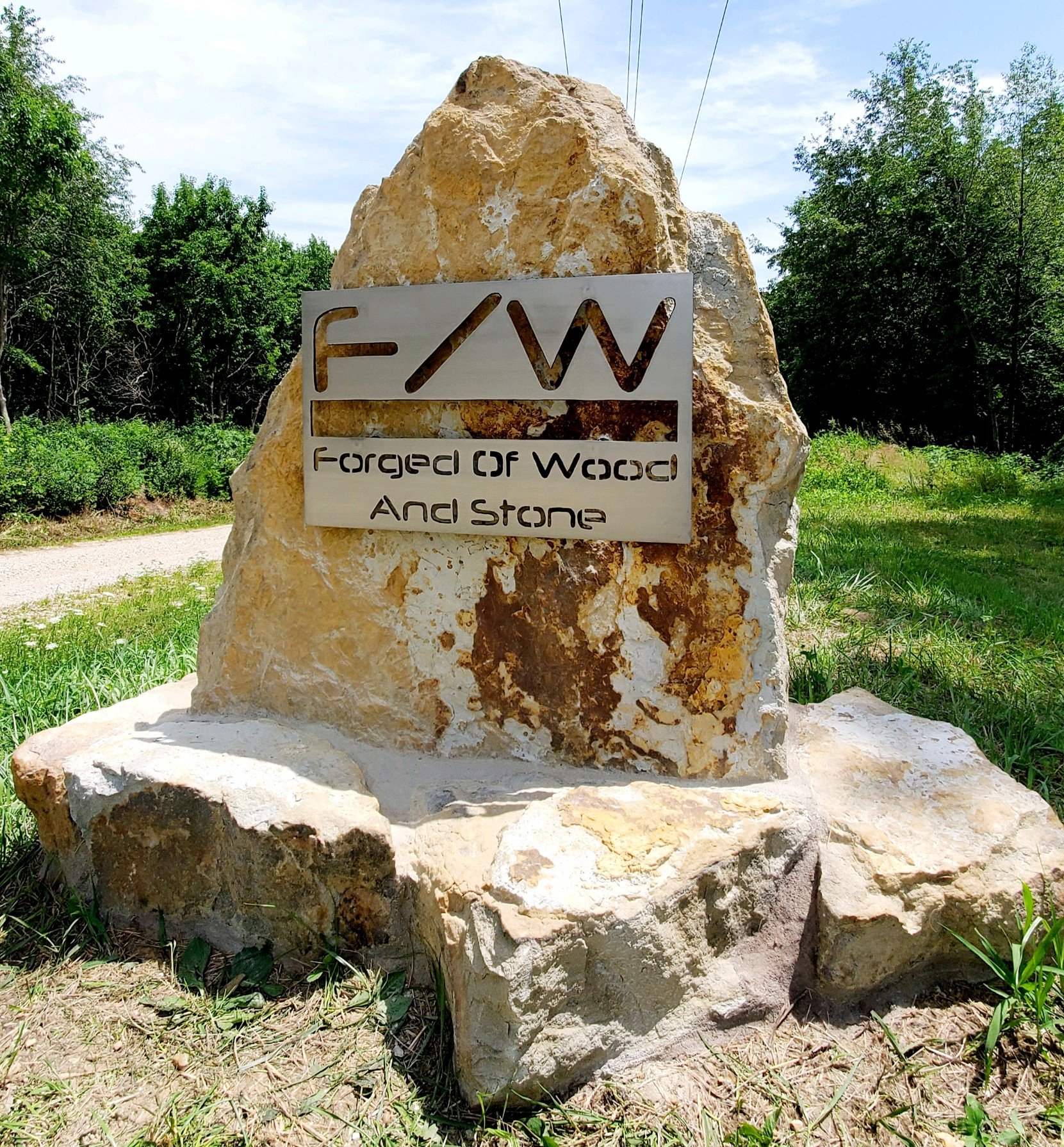 Entrance sign at Forged of Wood and stone