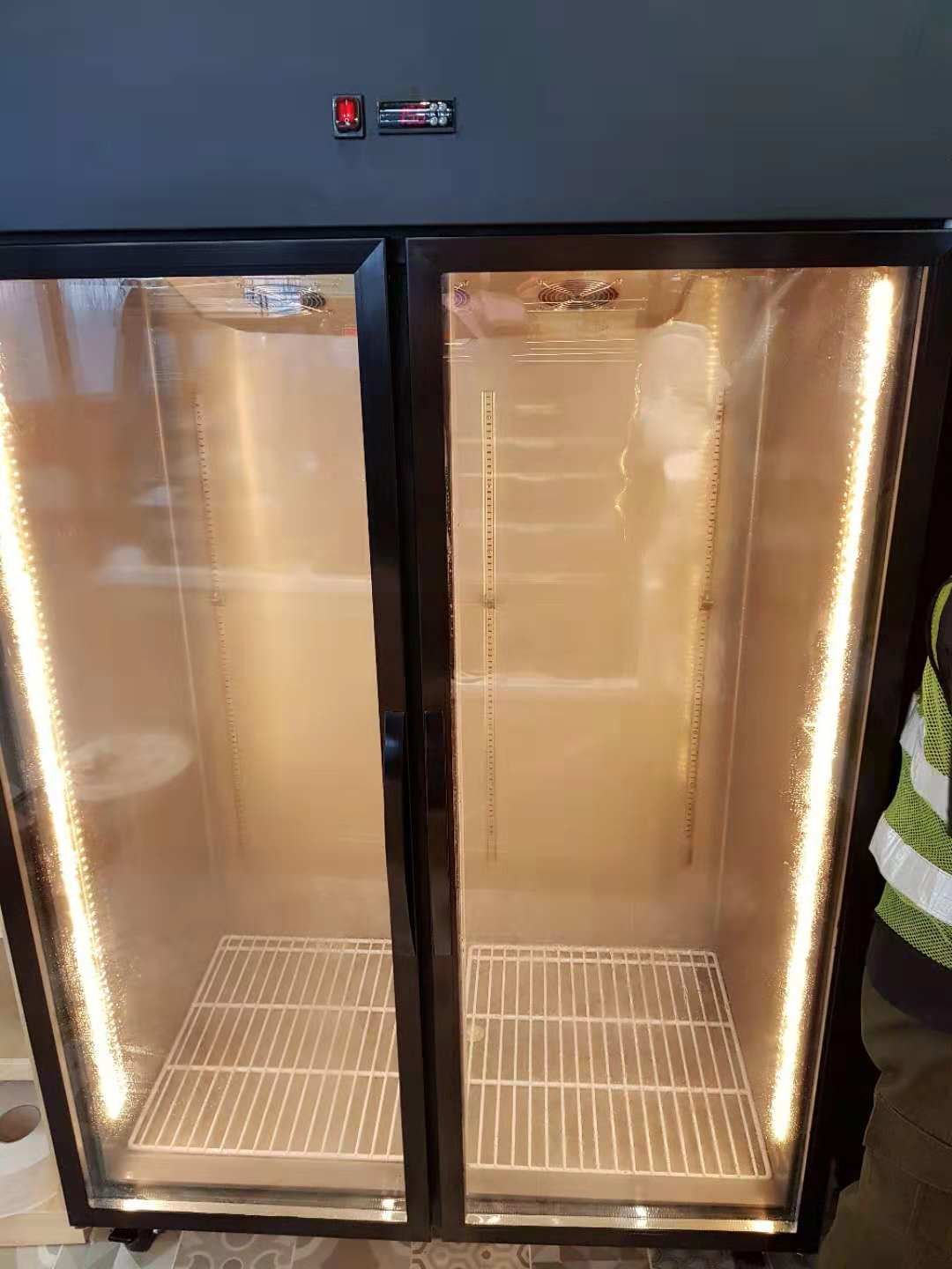 upright commercial refrigerator with glass door