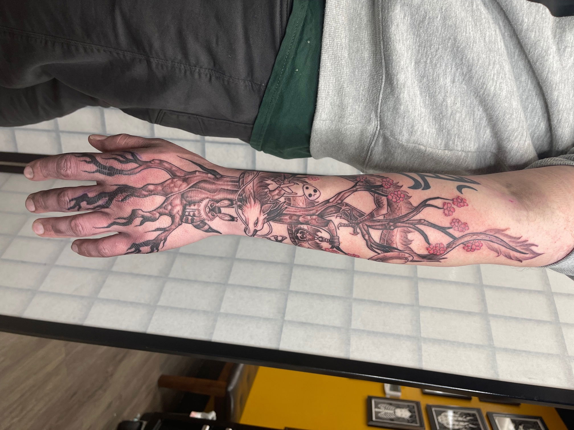 Studio Ghibli arm gauntlet tattoo