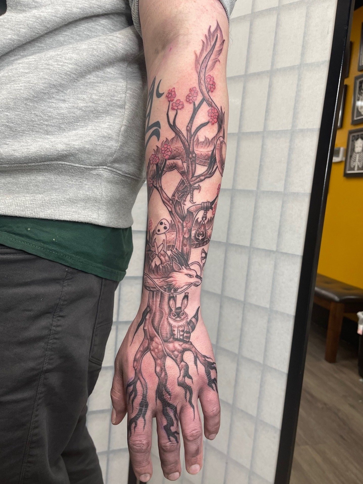 Studio Ghibli arm gauntlet tattoo