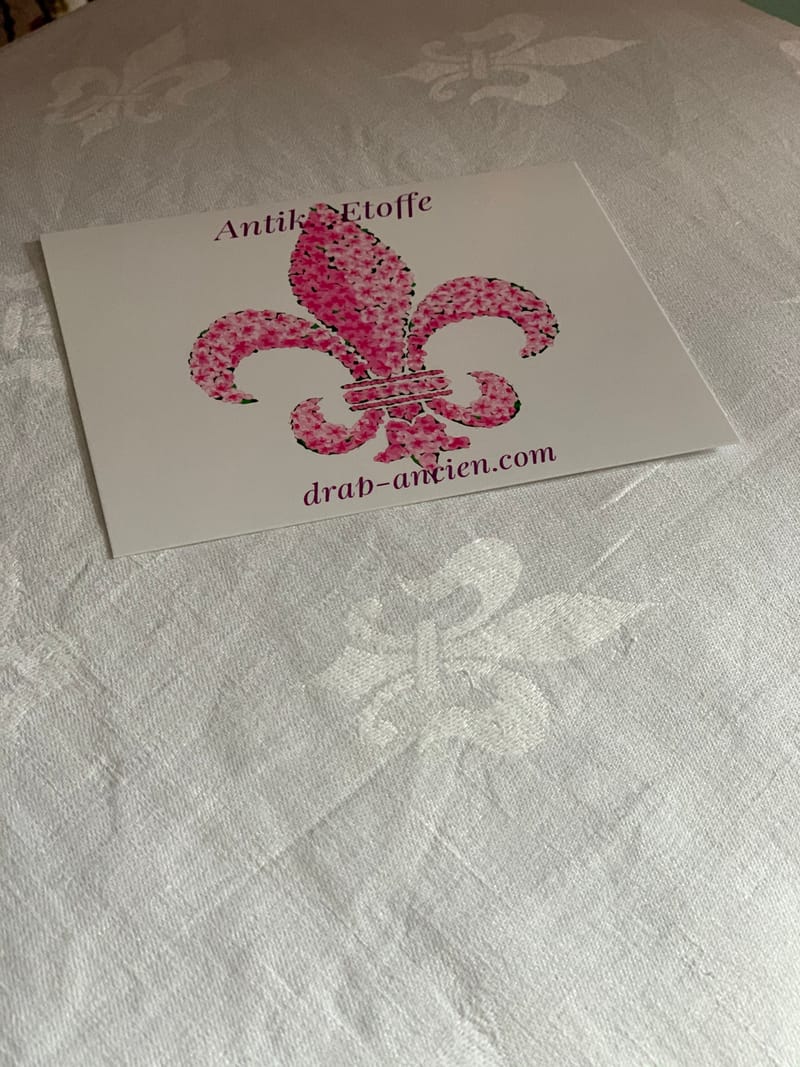 Drap en lin - Monogramme CM orné de brins et pois brodés mai