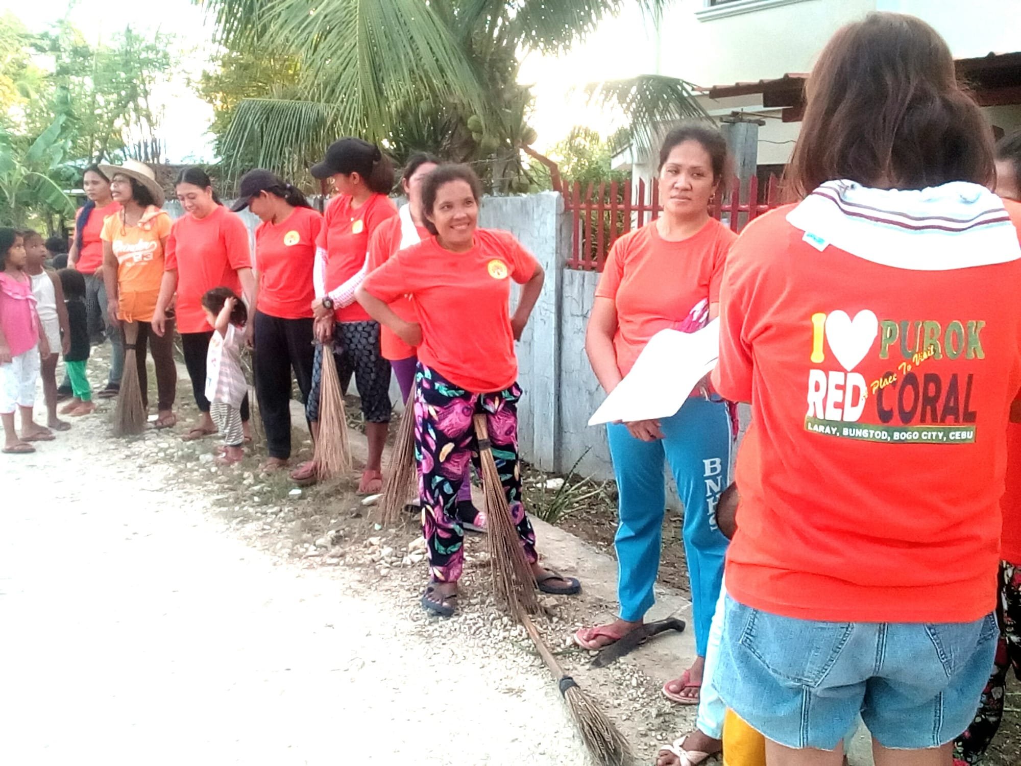 Red Coralians: Oranges on the Clean and Green Community