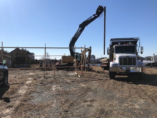Installing House Pilings for a New Home on Mohawk Dr in Little Egg Harbor