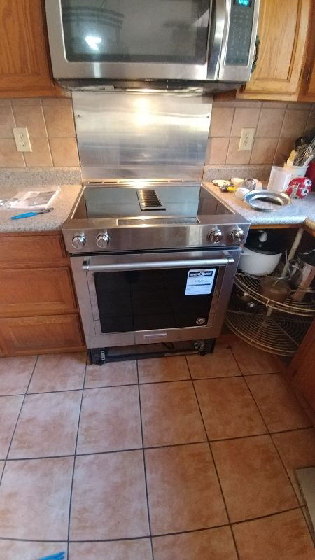 30" electric range with down draft install $250