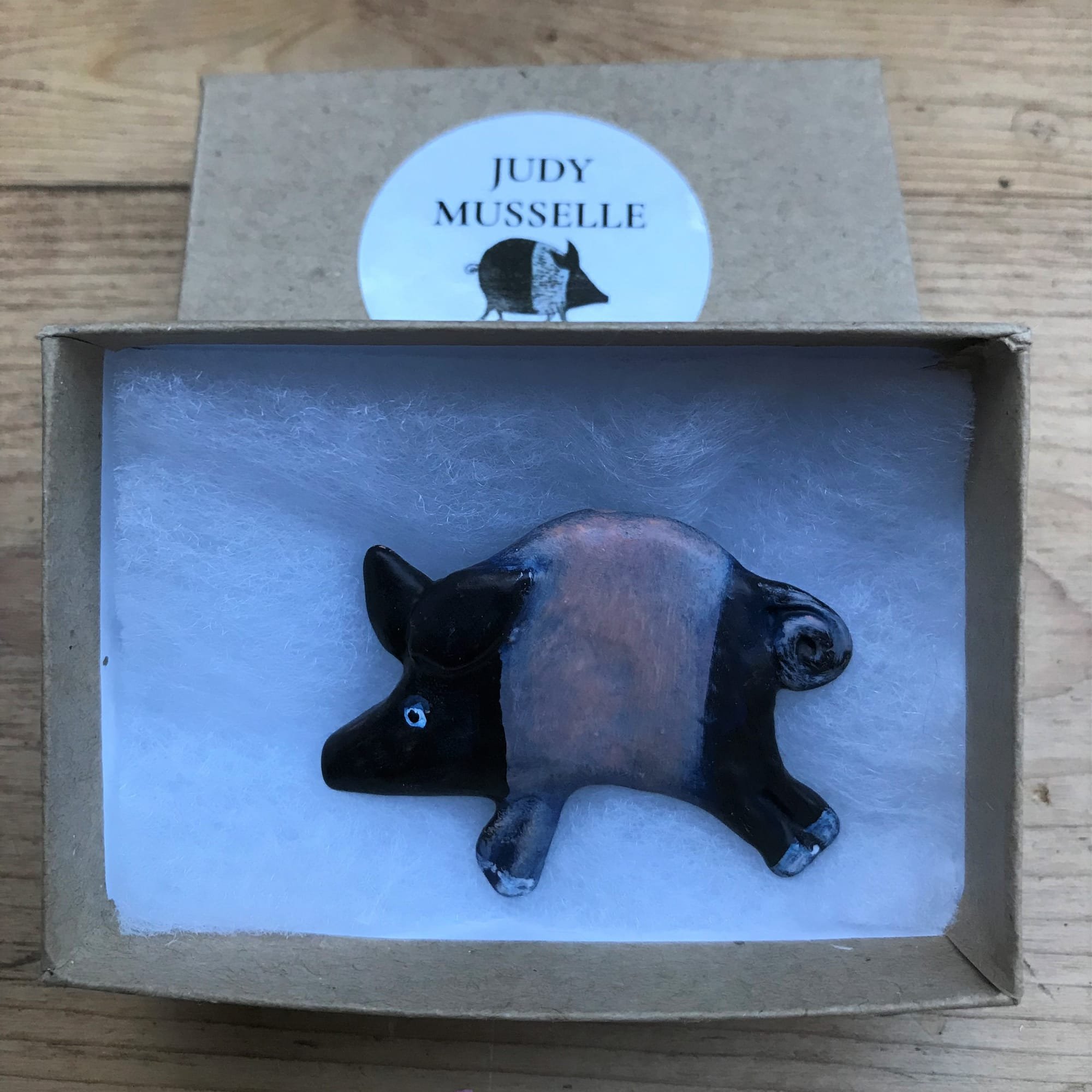 Curly Pig Brooch, hand-cast in pewter and hand-painted.