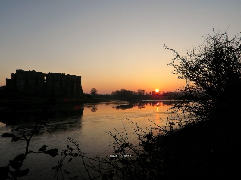 Carew Castle in Pembrokeshire at sunset