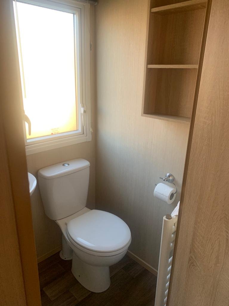 Main Bathroom With Shower Cubical And Toilet And Sink