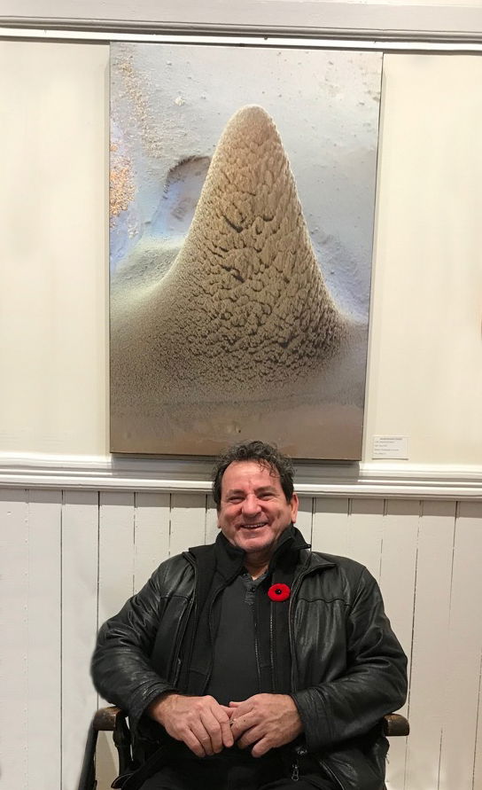 Artist with "Sand Pile"