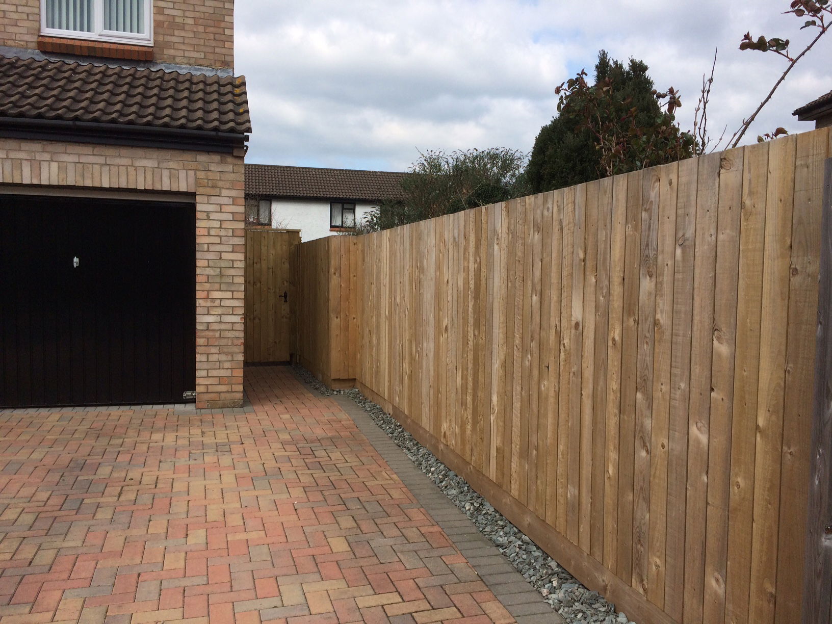 Feather edge fencing and side gate to match