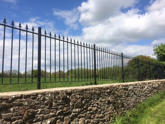 Wall top ornate scrolled fencing