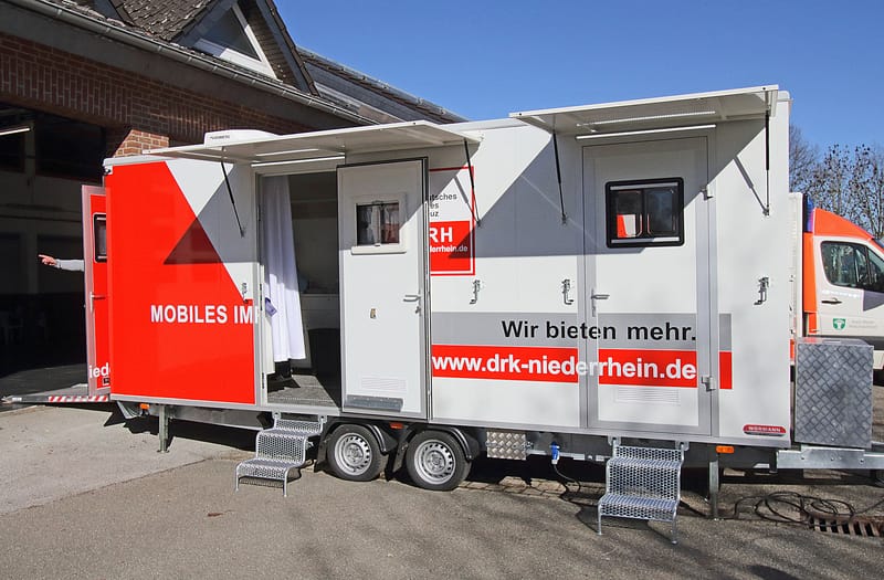 Covid-Impfungen auf dem Wochenmarkt