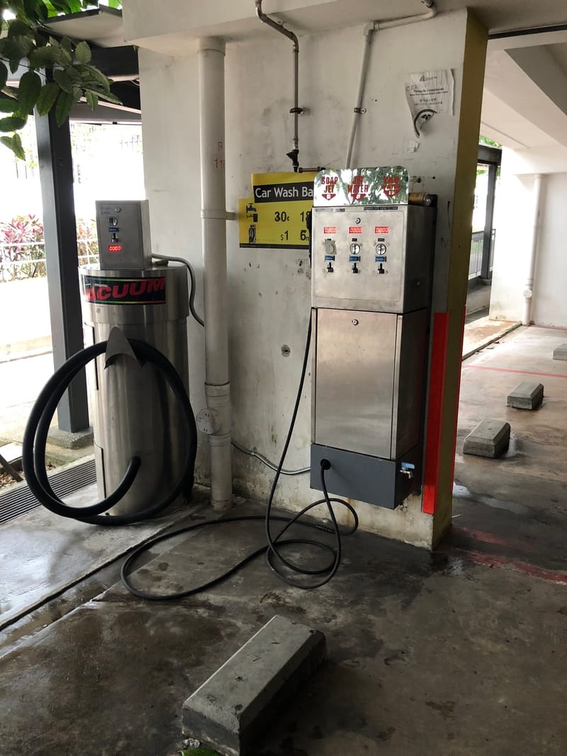 coin-operated-water-dispenser-at-hdb-car-park-washing-bay