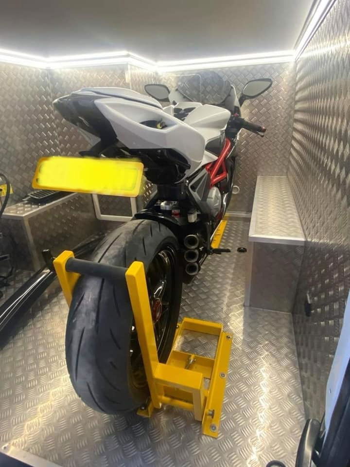 No More Straps The strapless motorcycle transportation mount