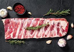 Costilla di Suino Iberico laccata al Miele di Acacia con Insalata di Finocchi e Arancia