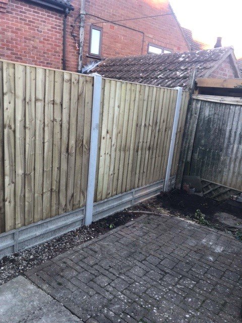 Featheredge Fence Panels with Concrete Posts and Gravel Boards
