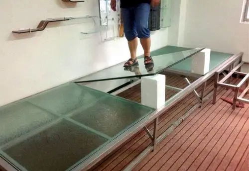 Numerical study of glass on four sides simply supported curtain wall under impact load.