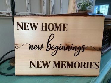 New Home, New beginnings sign