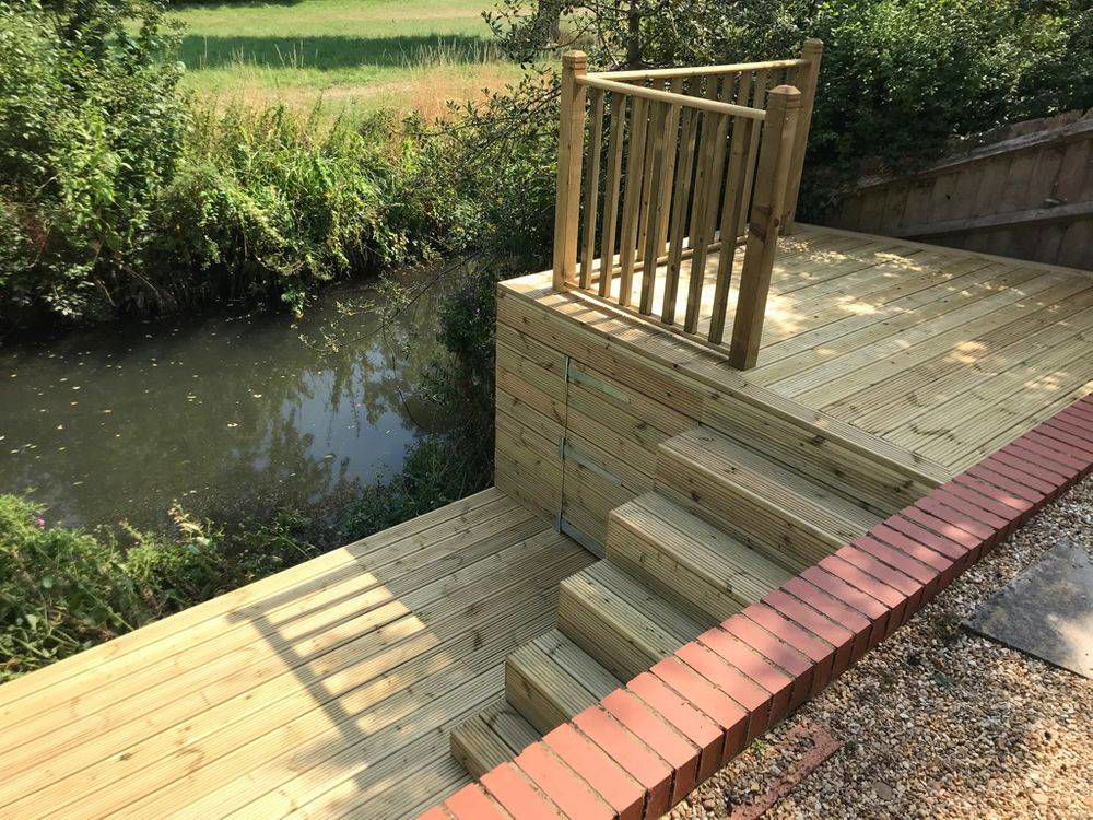 Design & construction of 2-tiered timber decking area - see slideshow page for project start to finish