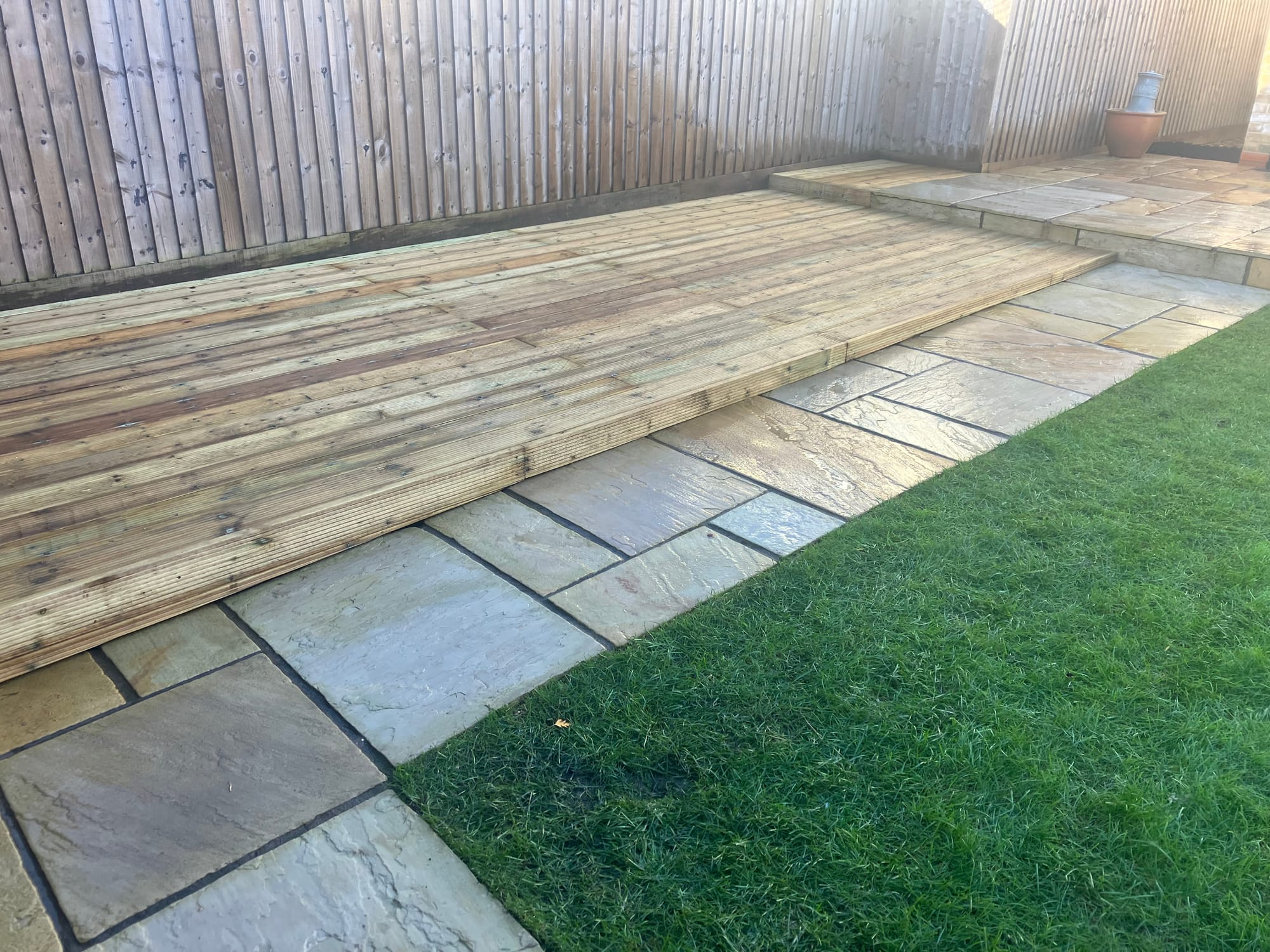 Addition of timber decking area to main garden