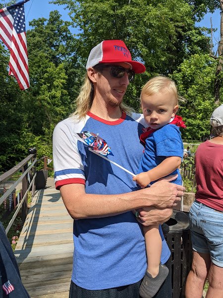 Jax and his dad joining the patriotic parade day