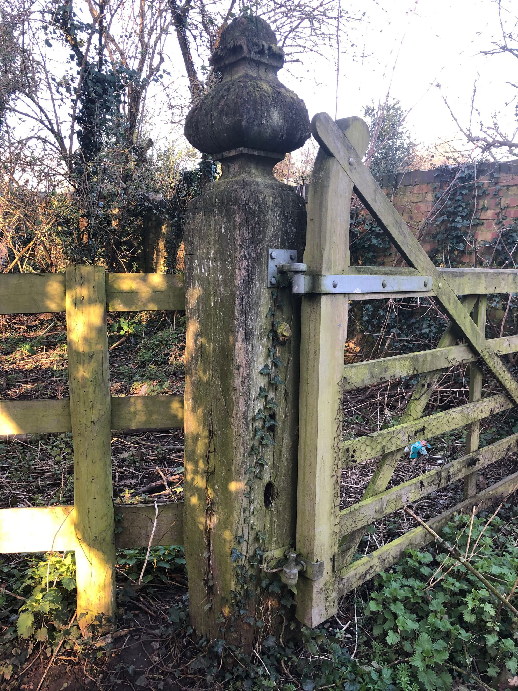 Old wooden post to the horse's field
