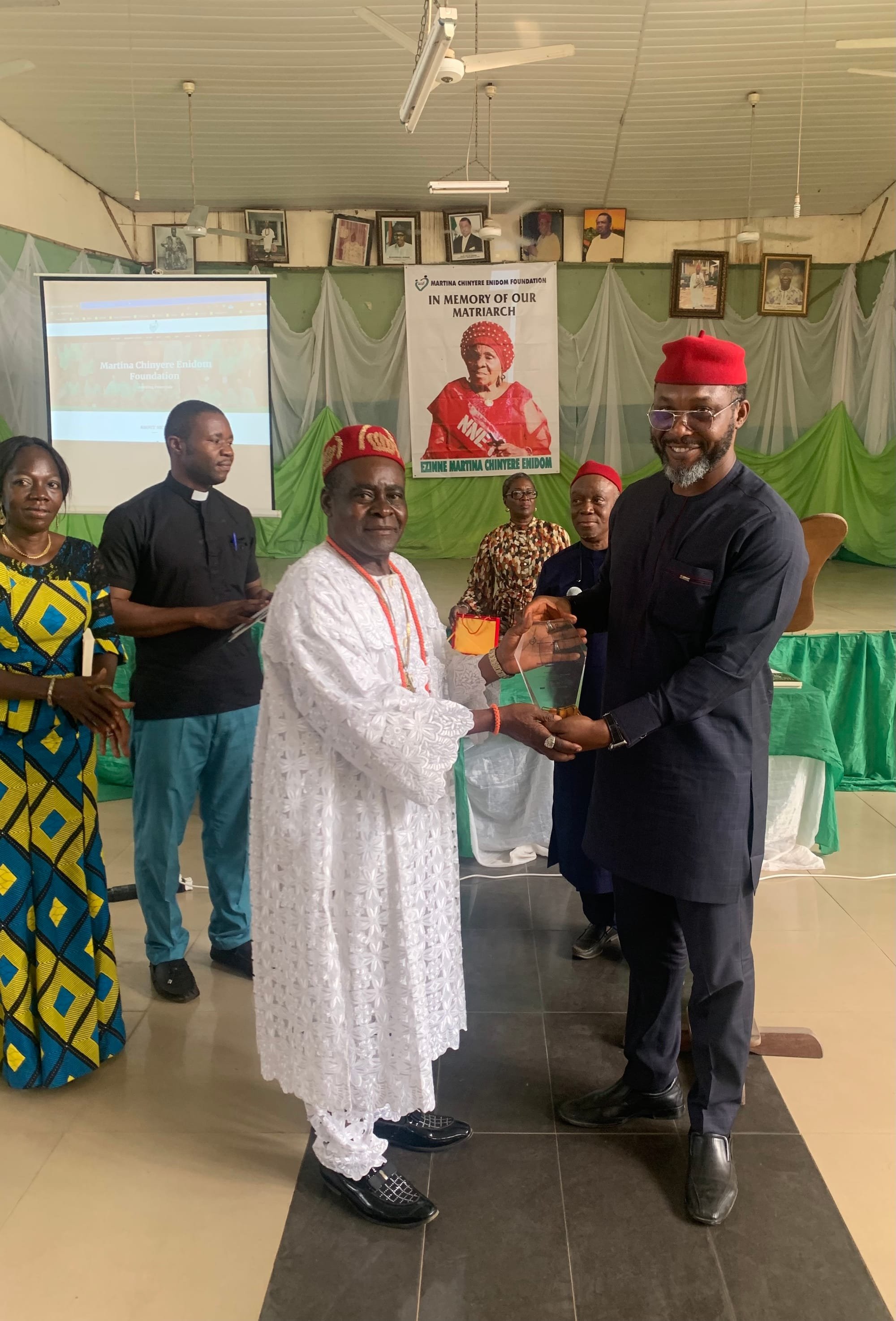 The Chairman of the occasion [Chief Osita Chidoka] delivering the award to the representatives of Chinechendo