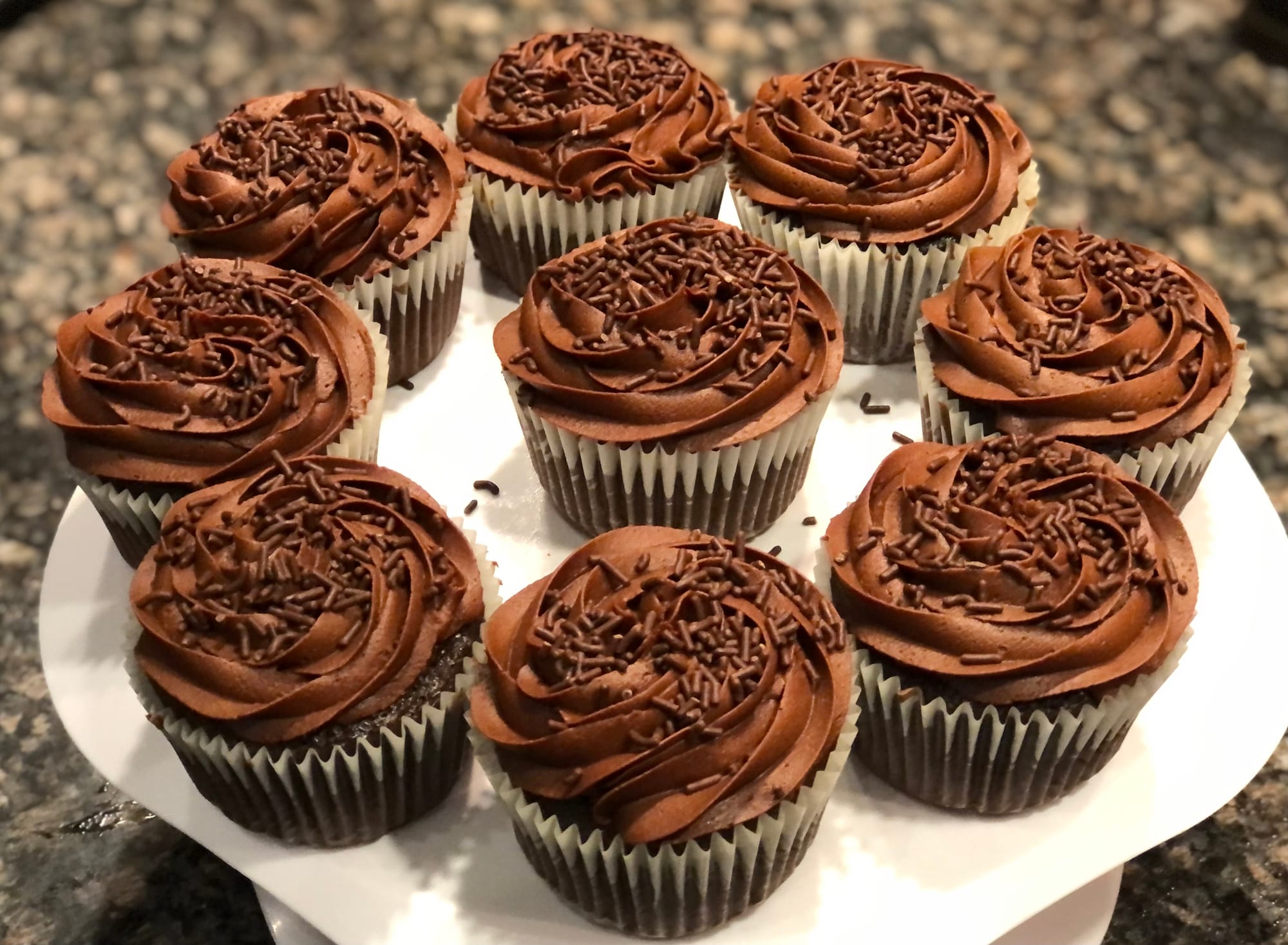 Chocolate Cupcakes With Chocolate Buttercream Frosting And Chocolate Sprinkles