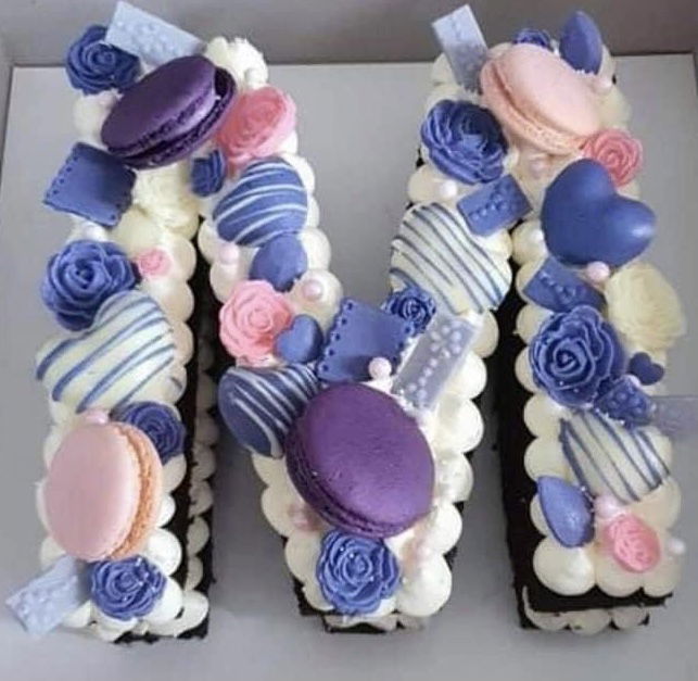 Letter M Chocolate Cake With Buttercream Frosting and Macarons Cabbit