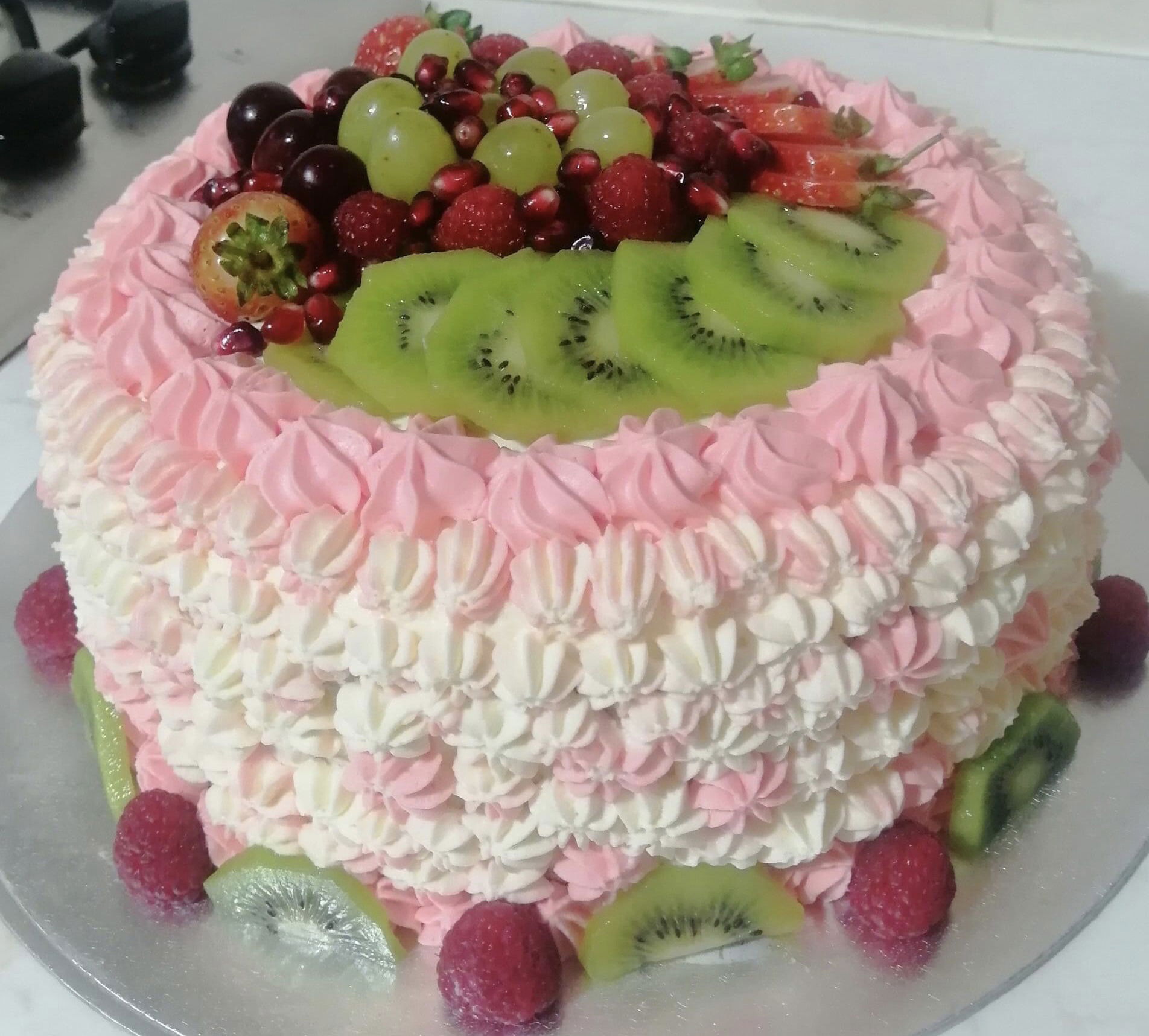 2 Layer Vanilla Cake With Raspberry Filling, Buttercream Frosting, and Fresh Fruit Cabbit Cakes