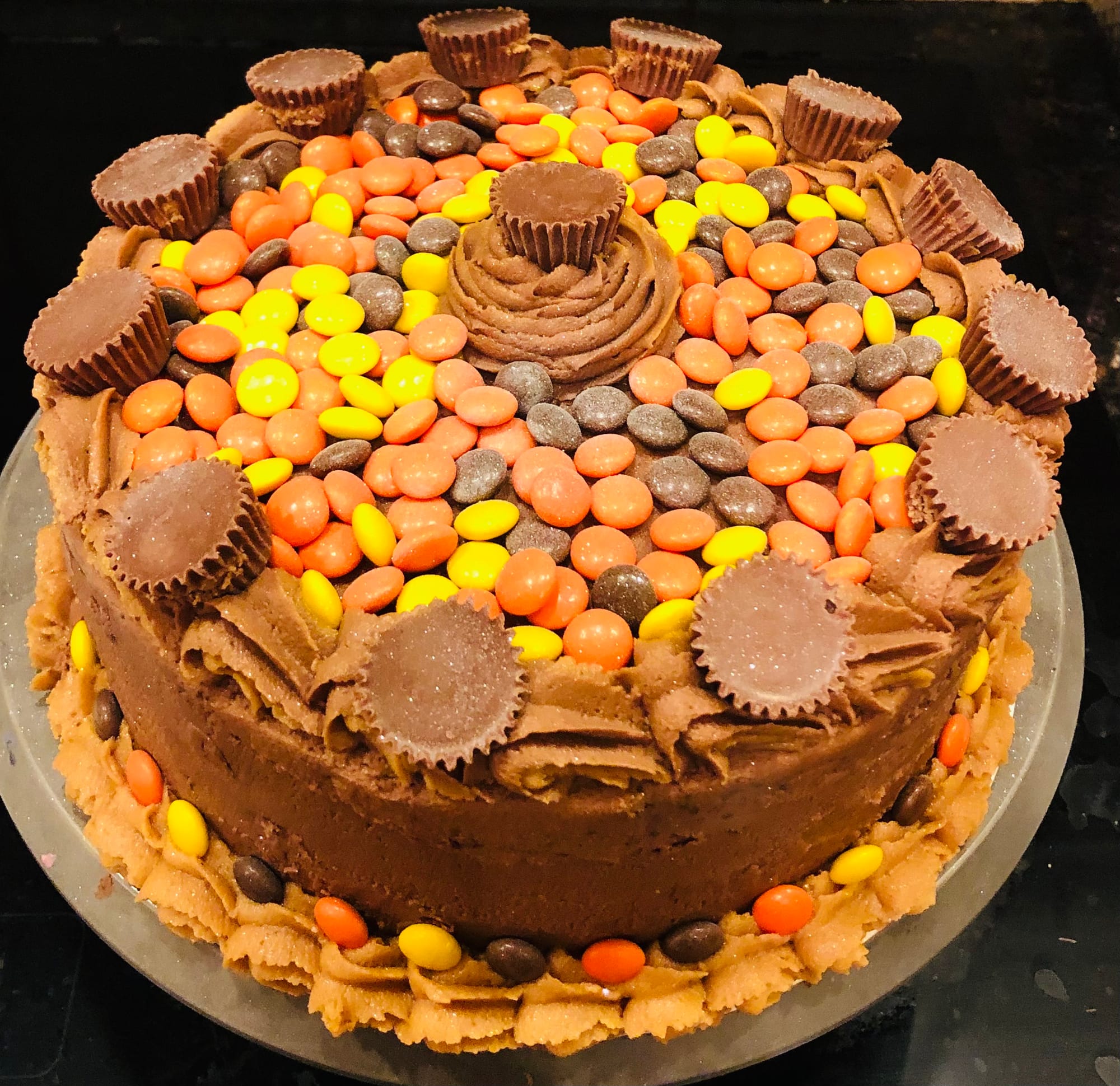 2 Layer Chocolate Reese’s Explosion Cake with Chocolate & Peanut Butter Frosting and Chocolate Candy