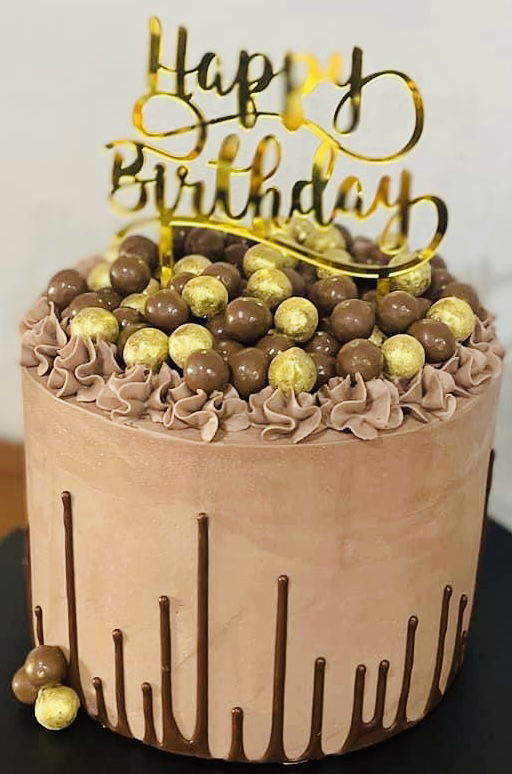 3 Layer Chocolate Overload Cake With Chocolate Buttercream Frosting, and Chocolate Candies