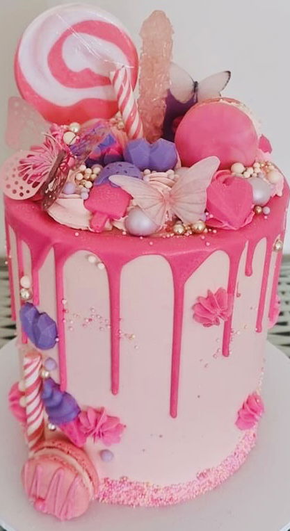 4 Layer Vanilla Butterfly Cake with Buttercream Frosting, Candy, and Macarons