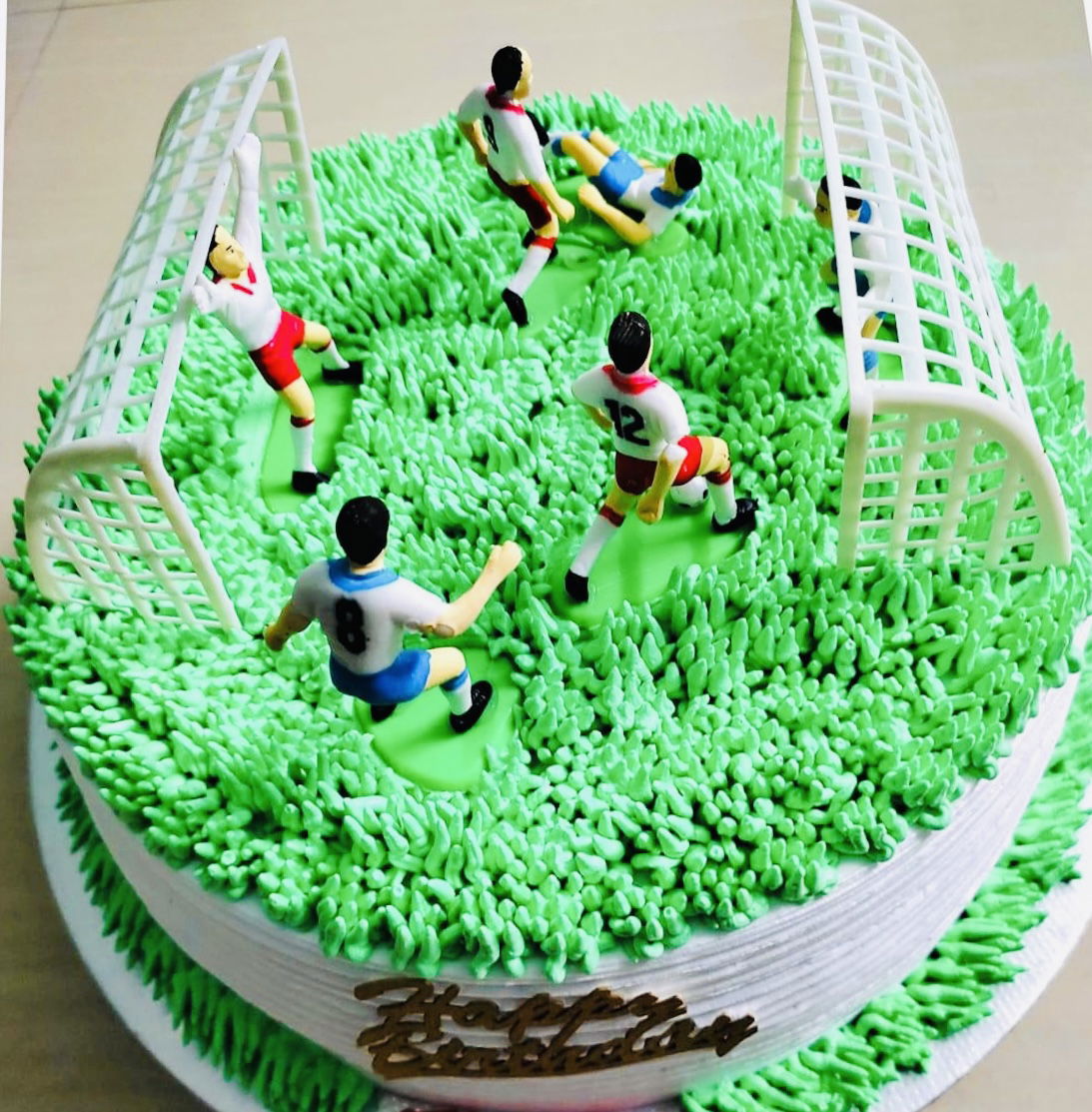2 Layer Vanilla Soccer Cake with Buttercream Frosting