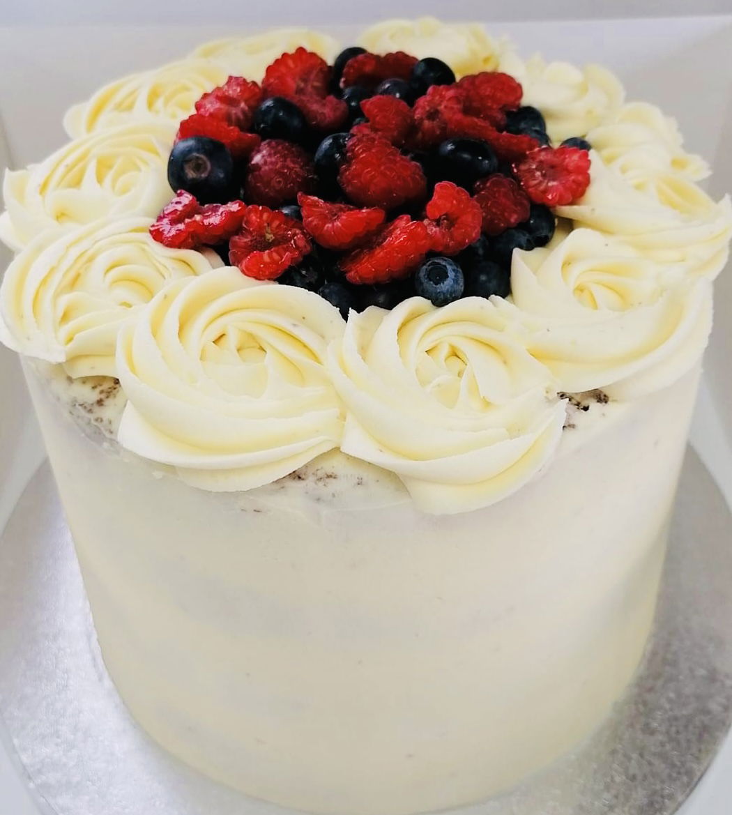 13 of 24 4 Layer Vanilla Cake With Buttercream Frosting and Fresh Fruit