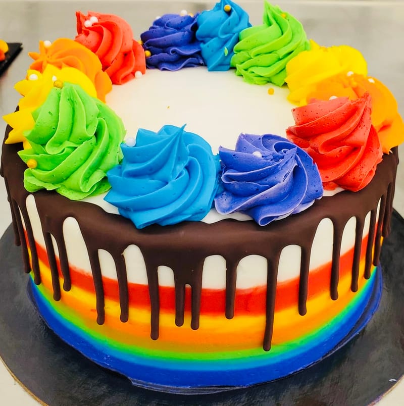 2-layer-vanilla-and-strawberry-rainbow-cake-with-buttercream-frosting