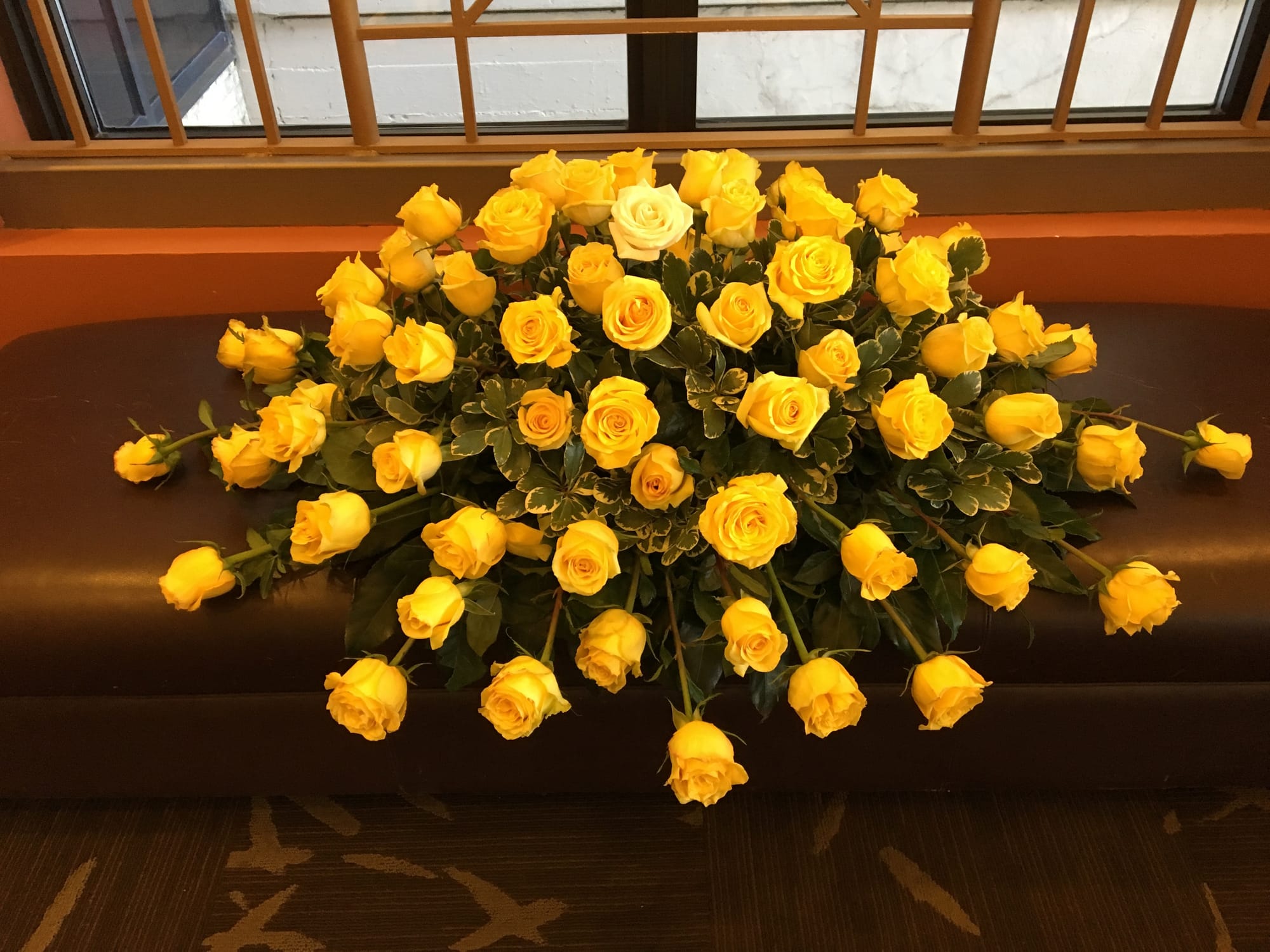 Yellow Roses Spray with One White