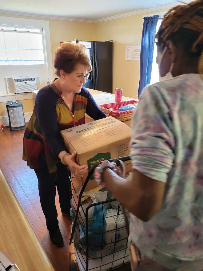 Janice, of Winterville FWB helping distribute Thanksgiving Meal Box Give-Away