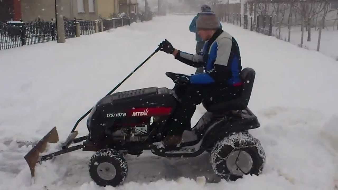 How to Park a Garden Tractor With Snow Blower On A Small Trailer?