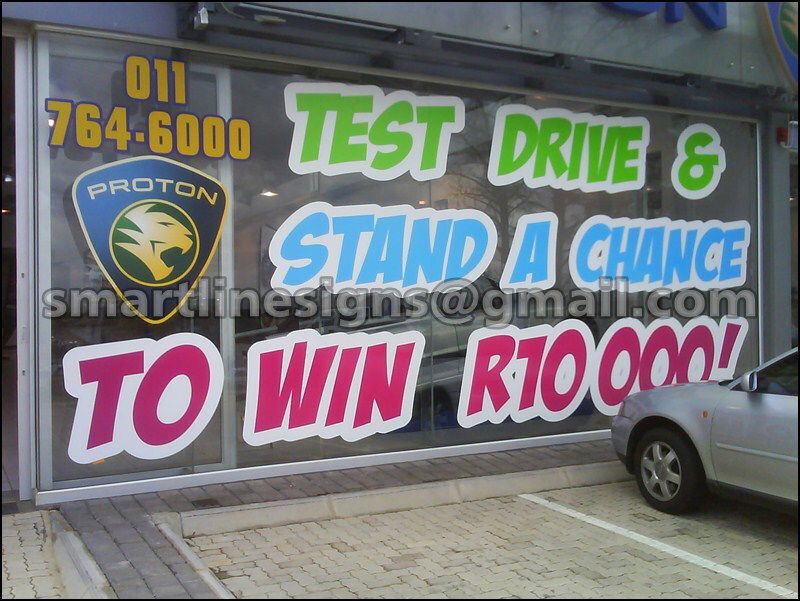 Vinyl Cut Decals on Car Dealership Windows SMARTLINE SIGNS