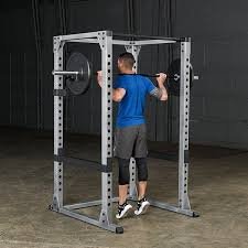 Power cage kneeling hands pull down rope