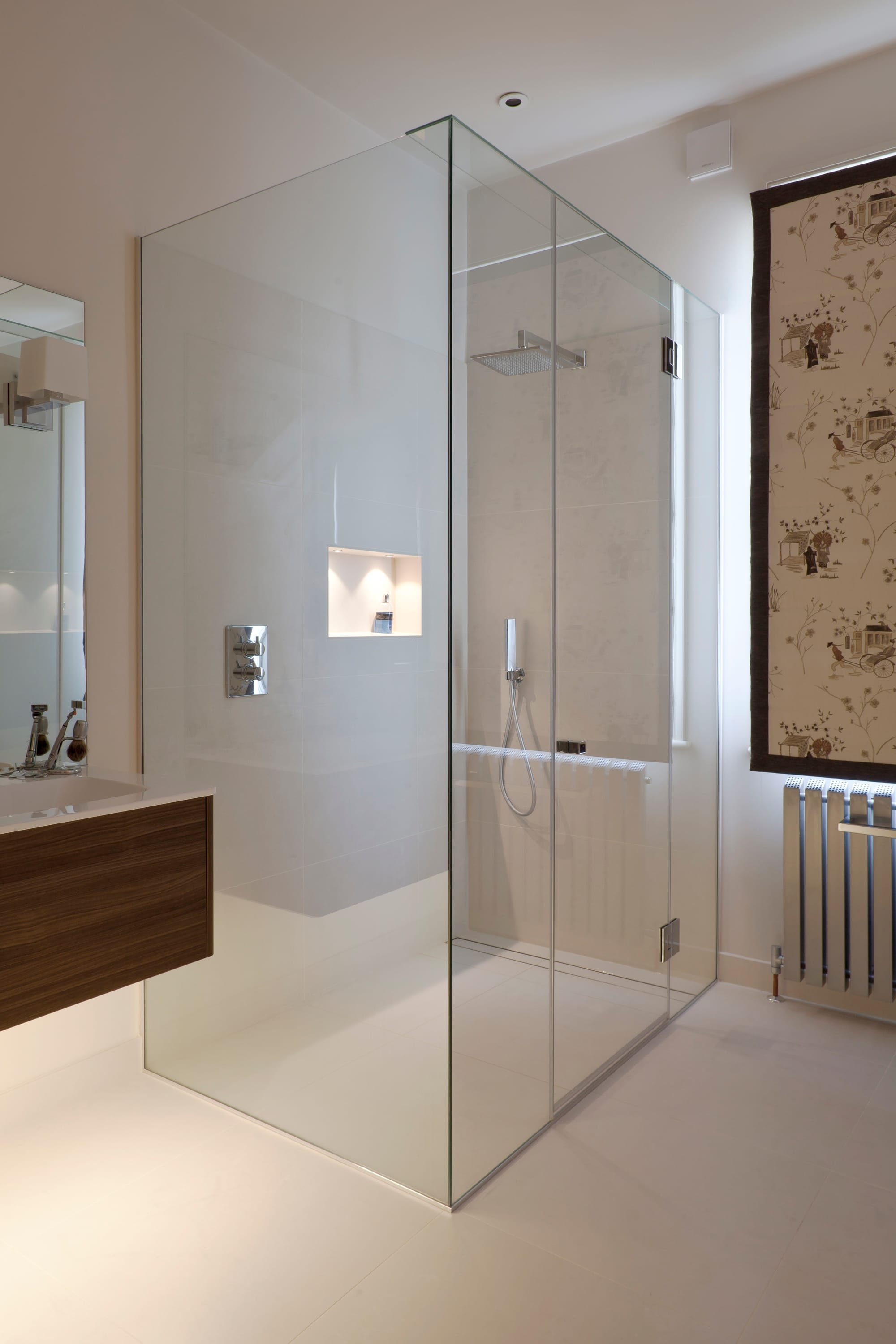 Sumptious shower in this SW11 bathroom with LED lit floating vanity unit and shower recess.